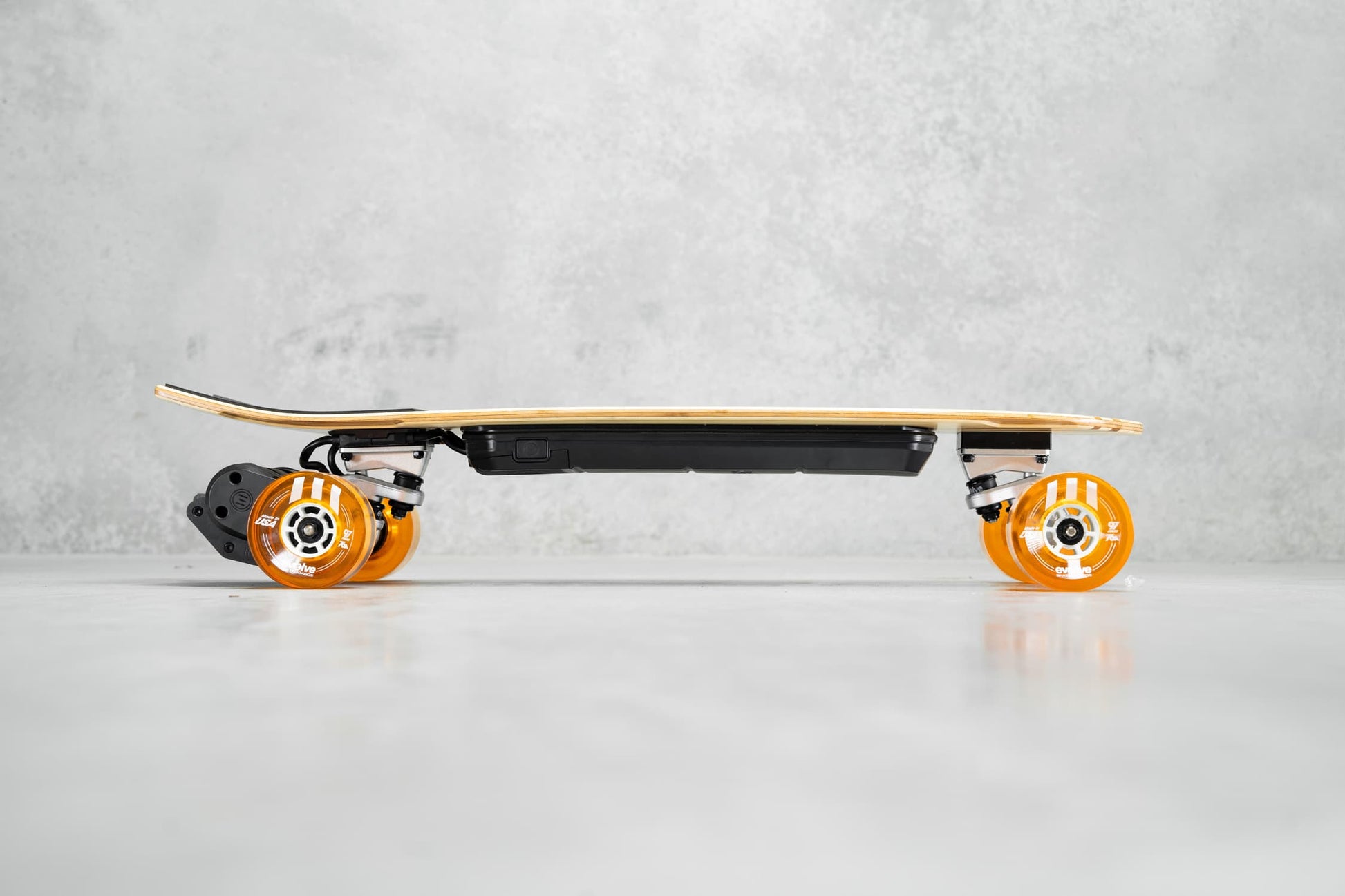 Evolve Skateboards Stoke X Bamboo Cruiser Electric Skateboard Orange Wheels