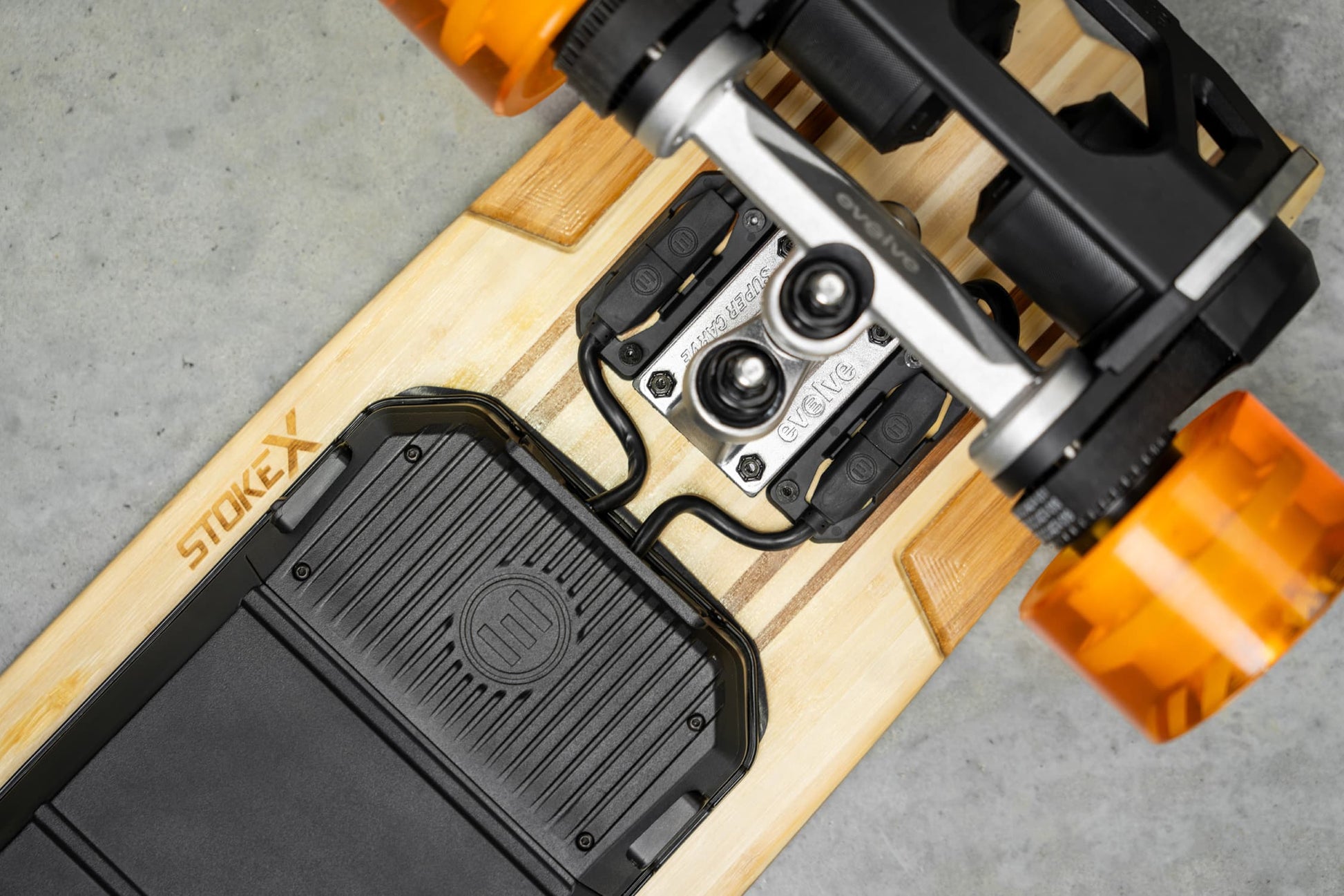 Evolve Skateboards Stoke X Bamboo Cruiser Electric Skateboard Orange Wheels