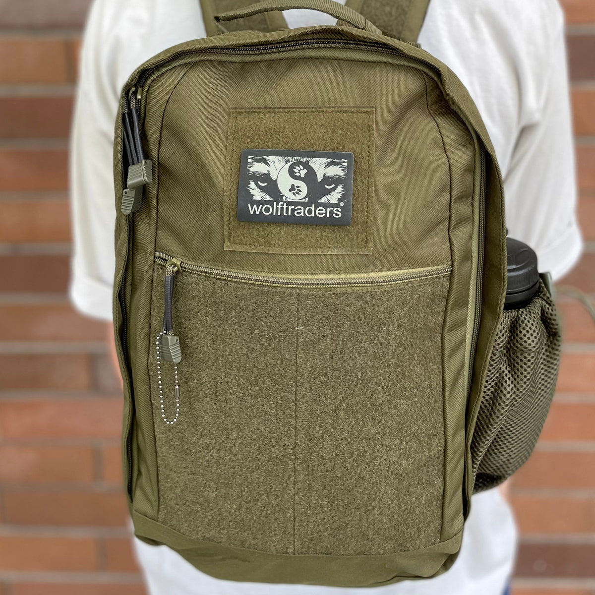Wolftraders CasualWolf 20-Liter Tactical Day Backpack od green on back