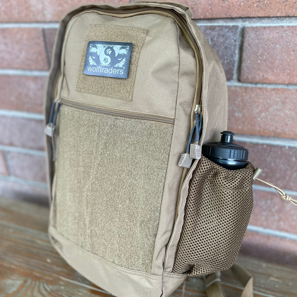 Wolftraders CasualWolf 20-Liter Tactical Day Backpack coyote tan bottle side